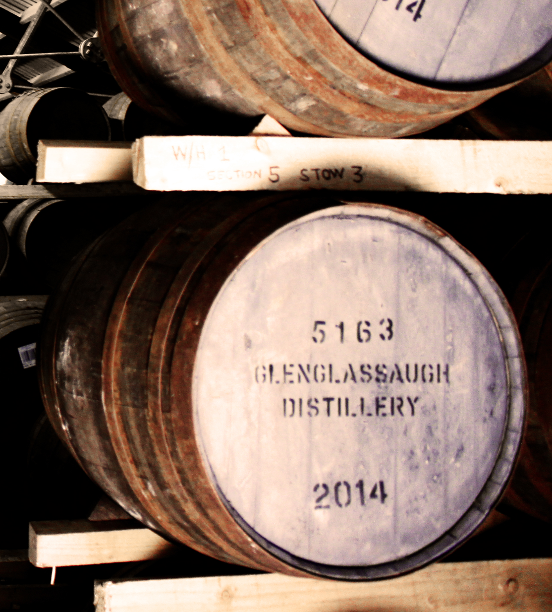 Stacked barrels at the Glenglassaugh Distillery.